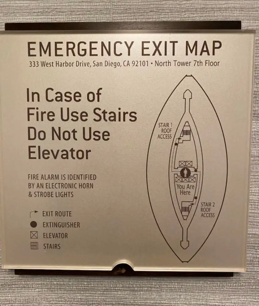A close-up of a beige emergency exit map for the 7th floor of the North Tower at 333 West Harbor Drive, San Diego, CA. The…