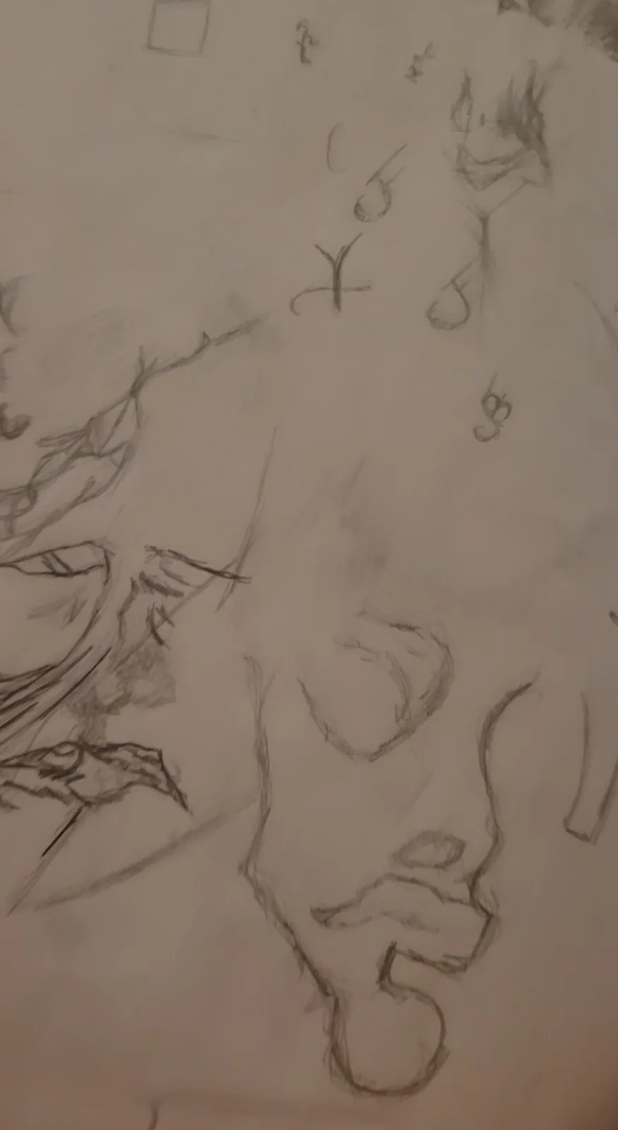 A rough pencil sketch on paper shows multiple unfinished character faces and scribbles, including a prominent side profile…