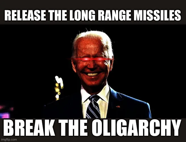 A digitally altered image of Joe Biden smiling, with red laser beams drawn across his eyes, overlaid with bold white text…
