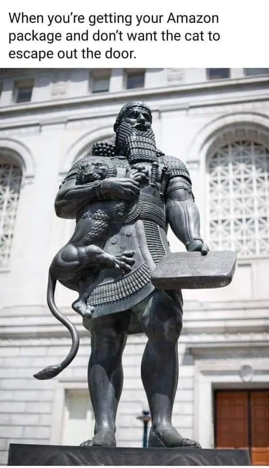 A statue of a bearded, armored man holding a lion, with the overlaid text reading 'When you're getting your Amazon package…