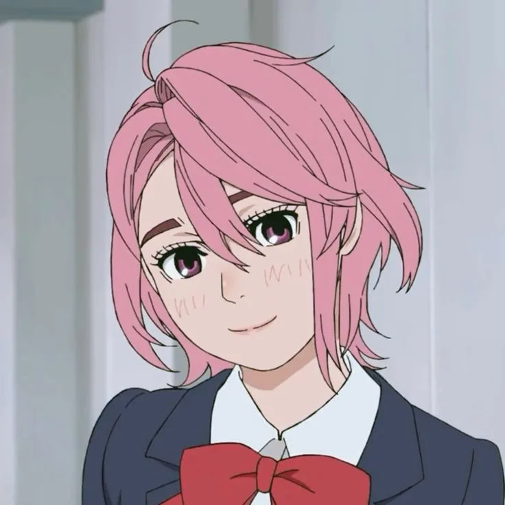 An anime girl with pink hair and purple eyes, wearing a dark blazer with a red bow tie, has a subtle, slightly embarrassed…