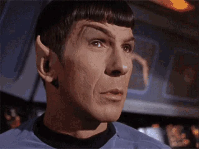 A six-panel image collage shows the character Spock from Star Trek in various close-up and medium shots, all wearing a blue…