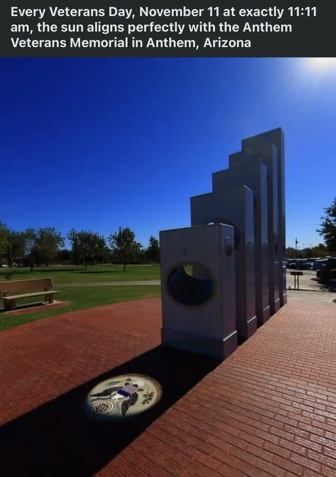 A photograph shows the Anthem Veterans Memorial in Anthem, Arizona, on a clear day with a bright blue sky. The memorial is a…