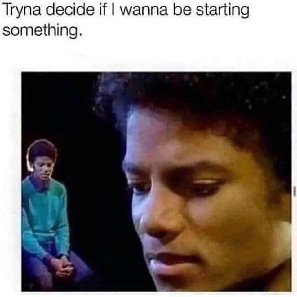 A close-up of Michael Jackson looking down with a pensive expression, while a smaller, faded version of him sits in the…